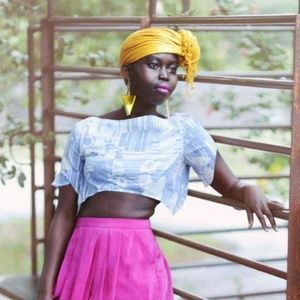 Melody Ehsani Gold glass earrings.